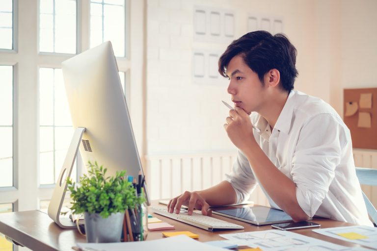 Man at his computer